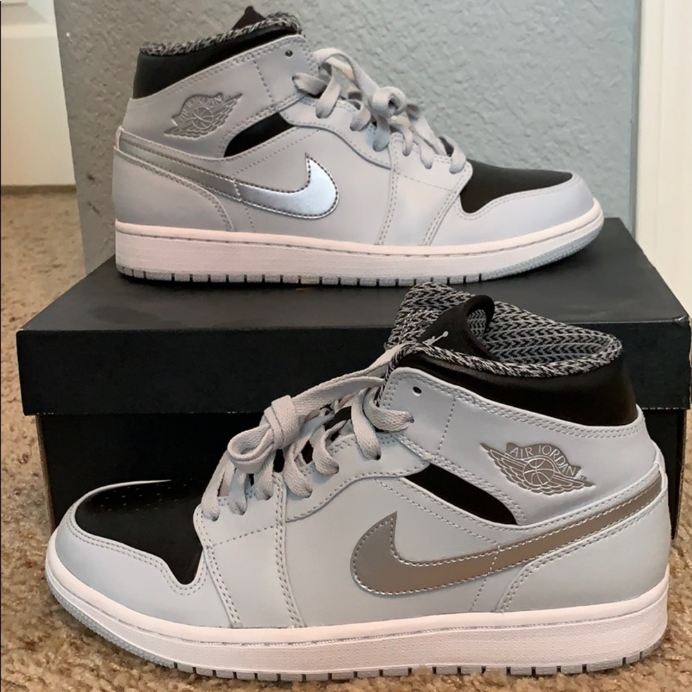 Jordan 1 platinum silver, black, and white